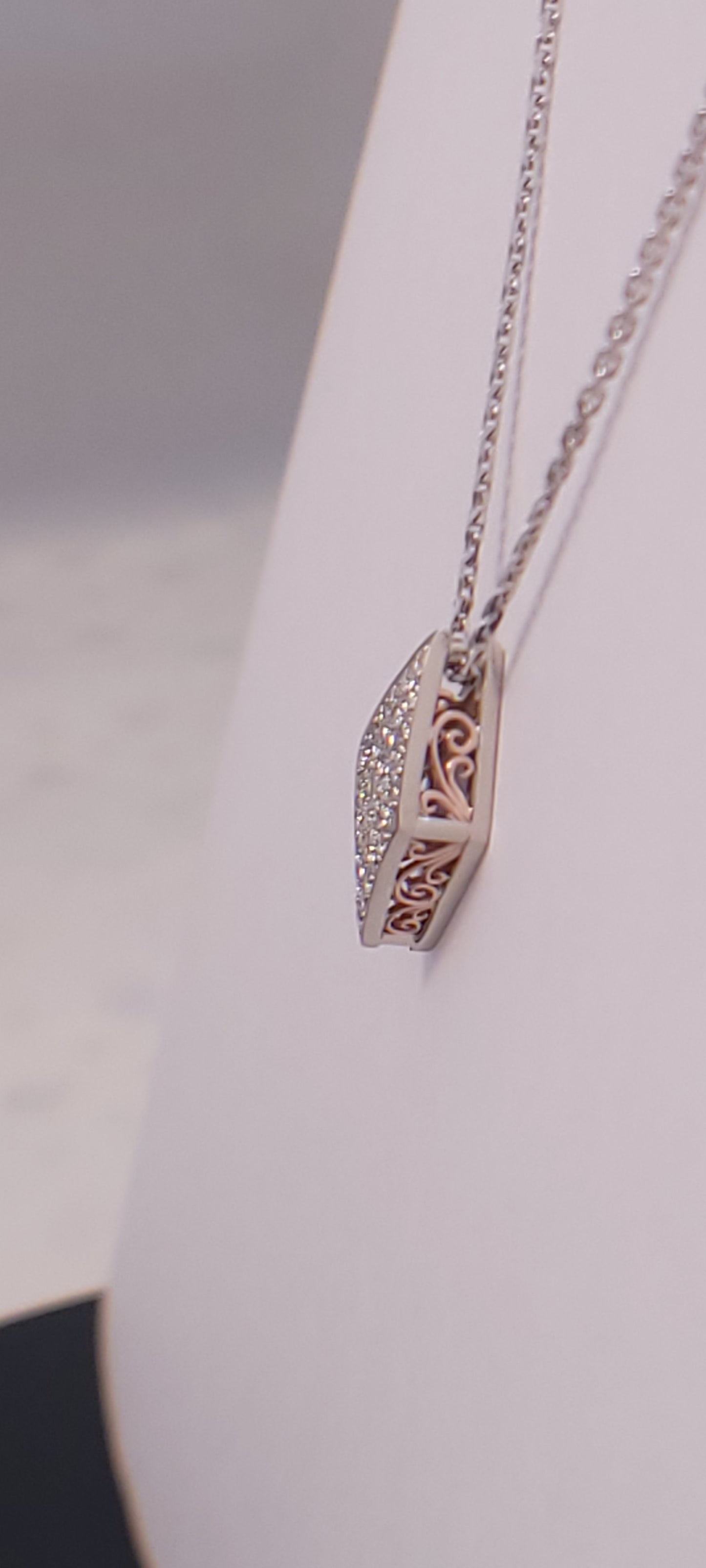 Small Rhombus diamond filigree pendant.