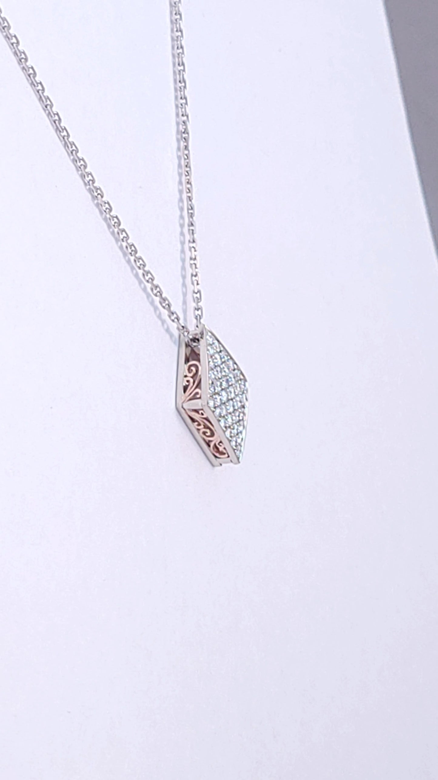 Small Rhombus diamond filigree pendant.