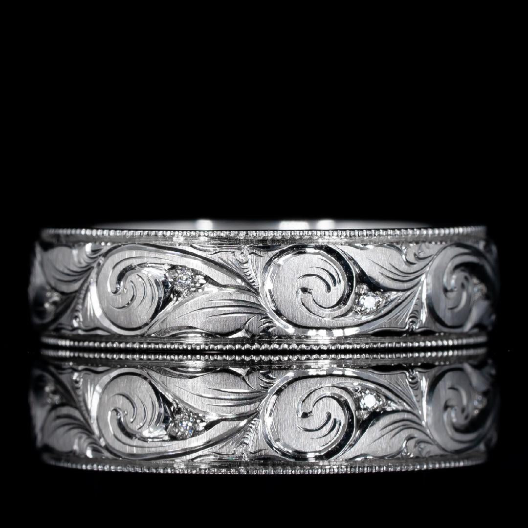 Engraved scroll wedding band with gemstone