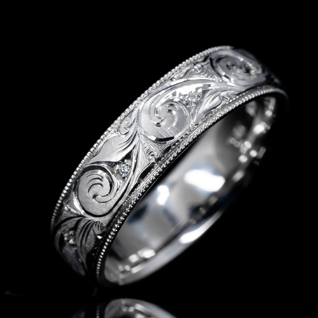 Engraved scroll wedding band with gemstone